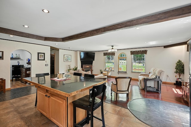 10 Tenacious Way, Augusta, ME 04330 - kitchen with a kitchen breakfast bar, a kitchen island, open floor plan, recessed lighting, and beam ceiling