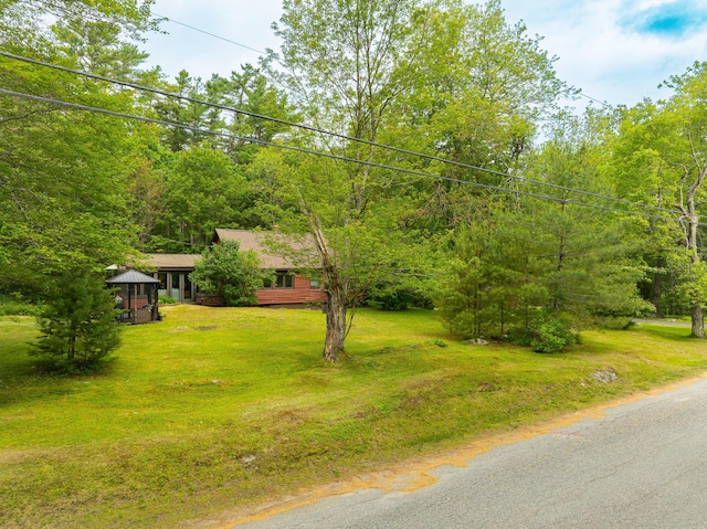 260 Coombs Rd, Brunswick, ME 04011 - view of green lawn with a wooded view