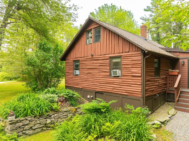 260 Coombs Rd, Brunswick, ME 04011 - view of property exterior featuring a chimney, cooling unit, roof with shingles, and board and batten siding