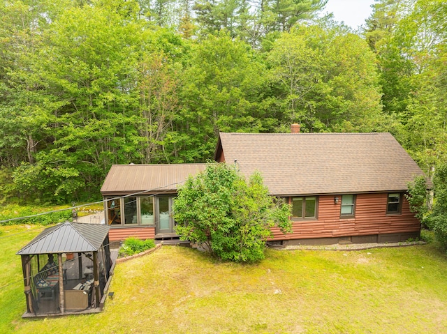 260 Coombs Rd, Brunswick, ME 04011 - back of house with a gazebo, a shingled roof, a yard, and a chimney