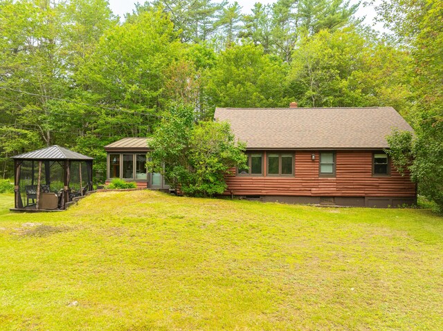260 Coombs Rd, Brunswick, ME 04011 - rear view of property featuring a gazebo, a shingled roof, and a yard