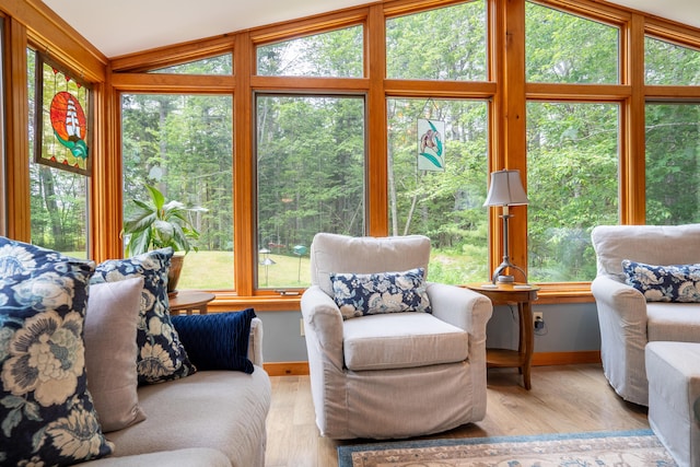 260 Coombs Rd, Brunswick, ME 04011 - living area featuring vaulted ceiling and wood finished floors