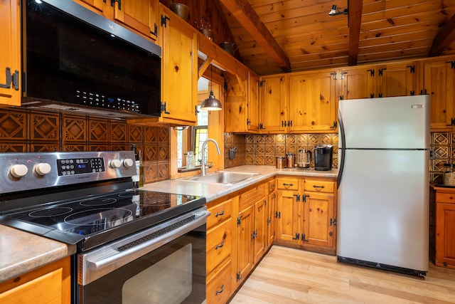 260 Coombs Rd, Brunswick, ME 04011 - kitchen with stainless steel appliances, wooden ceiling, light wood-style flooring, decorative backsplash, and light countertops
