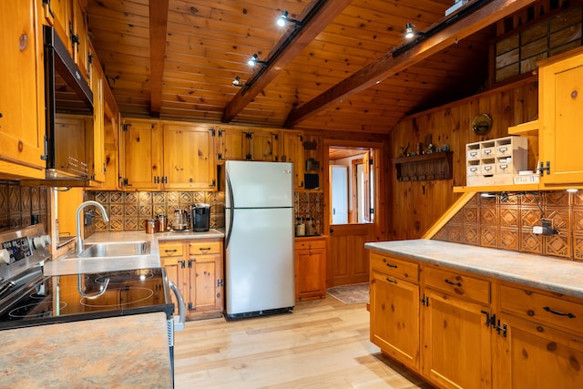 260 Coombs Rd, Brunswick, ME 04011 - kitchen with appliances with stainless steel finishes, backsplash, wood ceiling, light countertops, and light wood-style flooring