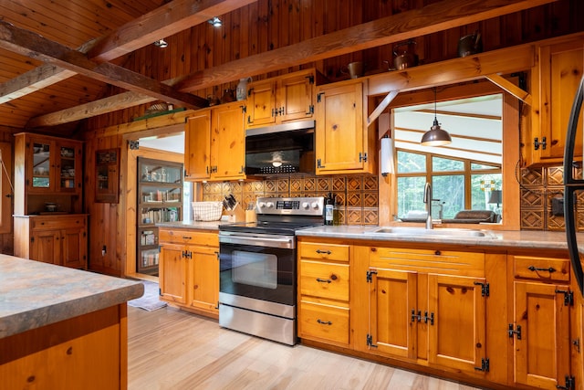 260 Coombs Rd, Brunswick, ME 04011 - kitchen with stainless steel appliances, a wood ceiling with exposed beams, tasteful backsplash, wood walls, and light countertops