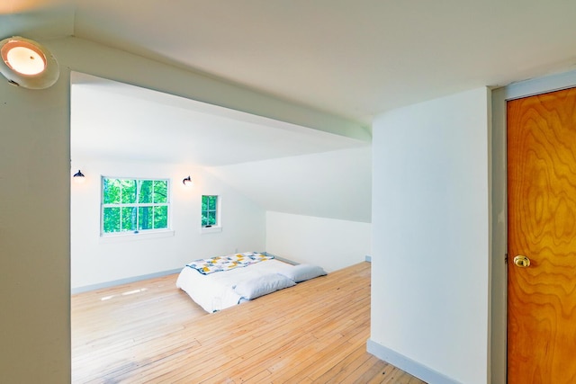 265 Greenacre Rd, Lincolnville, ME 04849 - bedroom featuring lofted ceiling and hardwood / wood-style floors