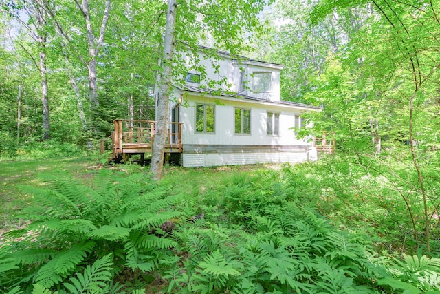265 Greenacre Rd, Lincolnville, ME 04849 - view of home's exterior with a wooden deck