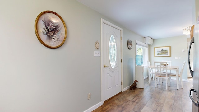 15 Cattail Ln, Monmouth, ME 04259 - entryway with hardwood / wood-style floors and a wall mounted AC