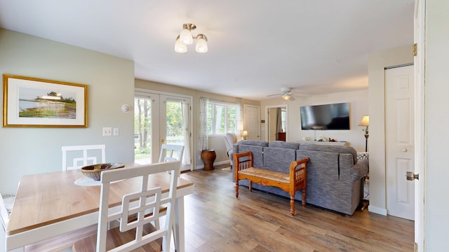 15 Cattail Ln, Monmouth, ME 04259 - living area featuring french doors, wood finished floors, and a ceiling fan