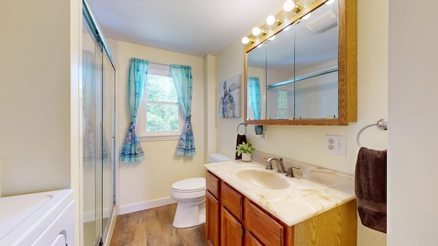 15 Cattail Ln, Monmouth, ME 04259 - bathroom with vanity, wood finished floors, and a shower with shower door