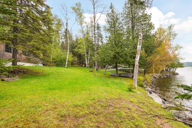 100 Bear Path, Rangeley, ME 04970 - view of green lawn with a water view