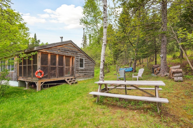 100 Bear Path, Rangeley, ME 04970 - view of grassy yard with a sunroom
