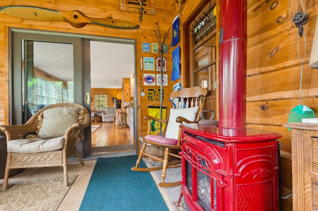 100 Bear Path, Rangeley, ME 04970 - sitting room with wood walls and carpet floors