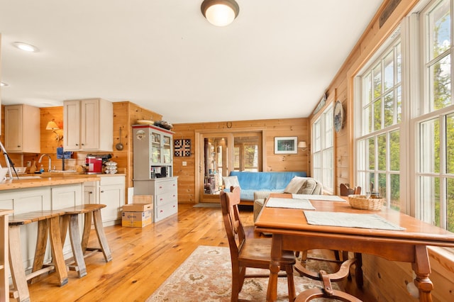 100 Bear Path, Rangeley, ME 04970 - dining space featuring light wood finished floors and wooden walls