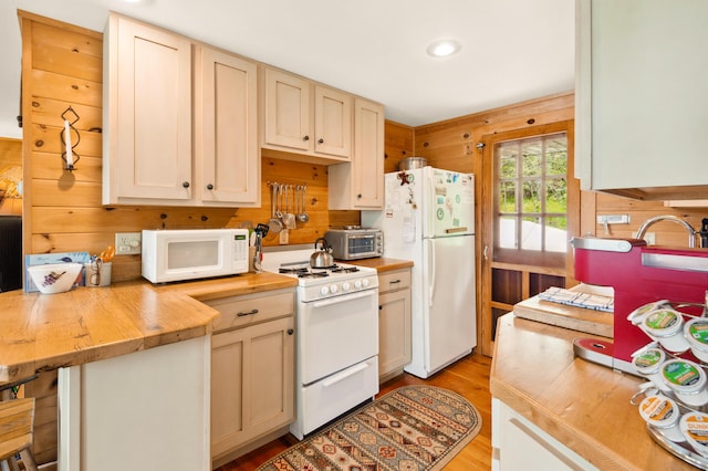 100 Bear Path, Rangeley, ME 04970 - kitchen with white appliances, wood counters, light wood finished floors, and recessed lighting