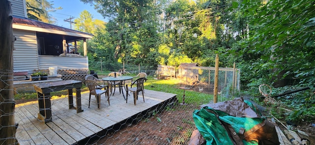 48 Gary St, Paris, ME 04281 - wooden terrace with outdoor dining area and a fenced backyard