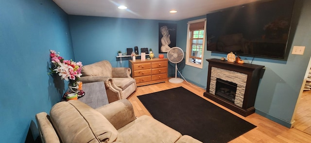 48 Gary St, Paris, ME 04281 - living area with wood finished floors, recessed lighting, and a fireplace