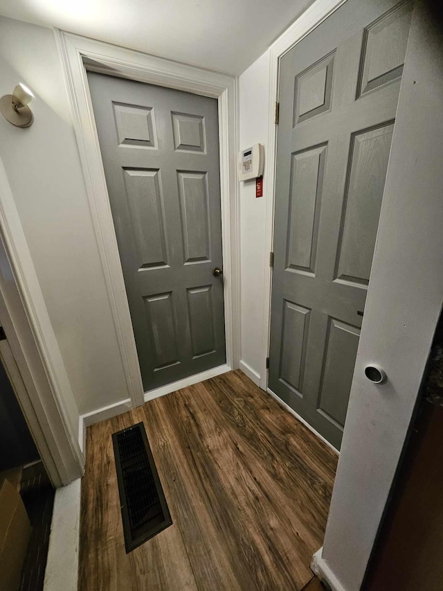 48 Gary St, Paris, ME 04281 - entryway with dark wood-type flooring and baseboards