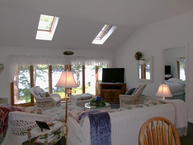 24 Paradise Dr, Monmouth, ME 04259 - living room featuring a skylight and vaulted ceiling