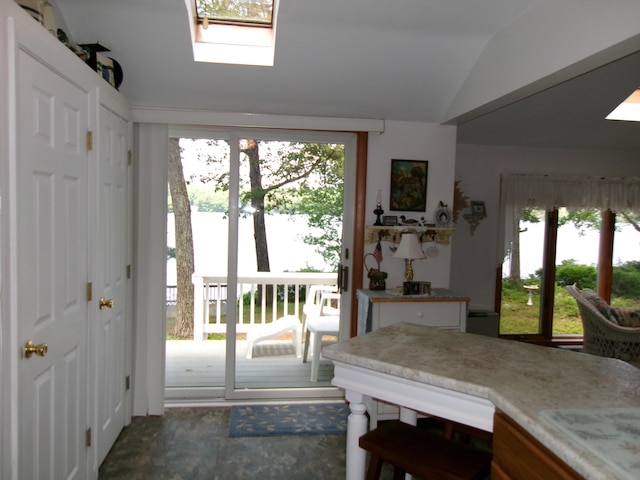 24 Paradise Dr, Monmouth, ME 04259 - entryway with healthy amount of natural light, a skylight, and lofted ceiling