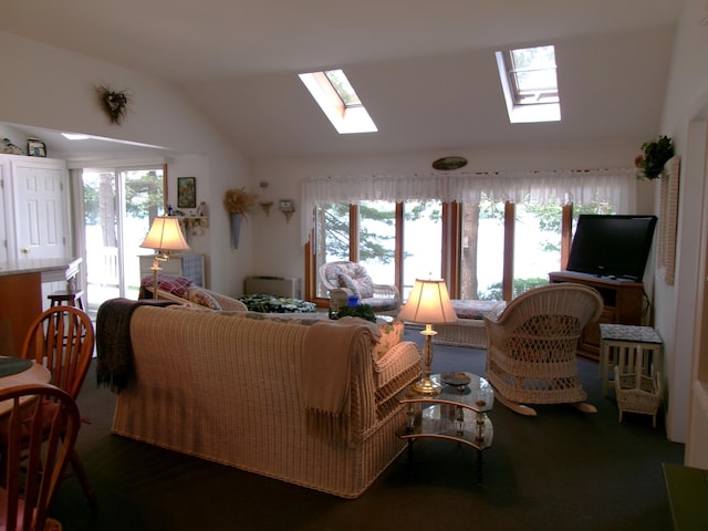 24 Paradise Dr, Monmouth, ME 04259 - living area featuring a skylight, lofted ceiling, and healthy amount of natural light