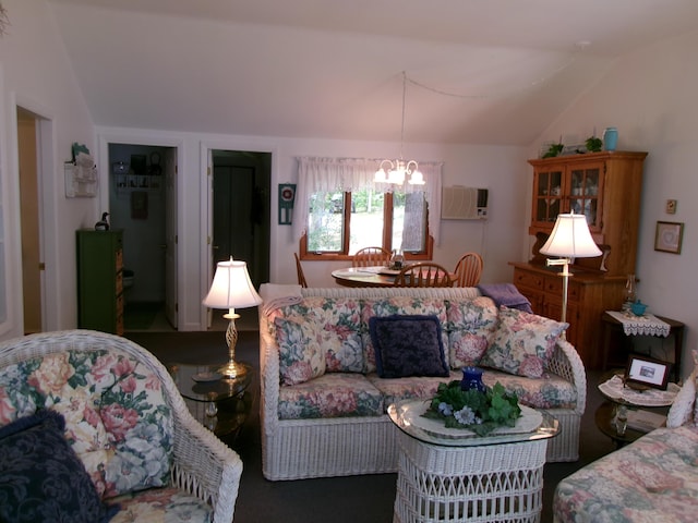 24 Paradise Dr, Monmouth, ME 04259 - living room with a wall mounted AC, a chandelier, and vaulted ceiling