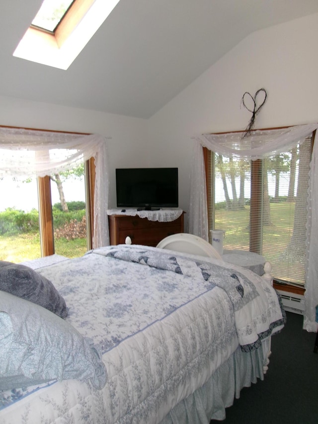24 Paradise Dr, Monmouth, ME 04259 - bedroom with lofted ceiling, a skylight, and baseboard heating