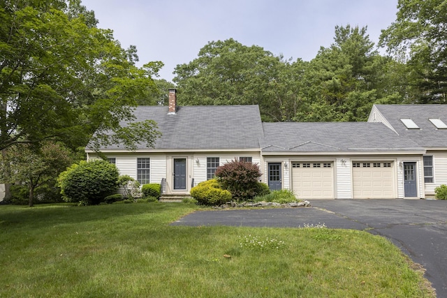 3 Cape Woods Dr Unit 3, Cape Elizabeth, ME 04107 - view of front facade featuring an attached garage, driveway, a chimney, and a front lawn