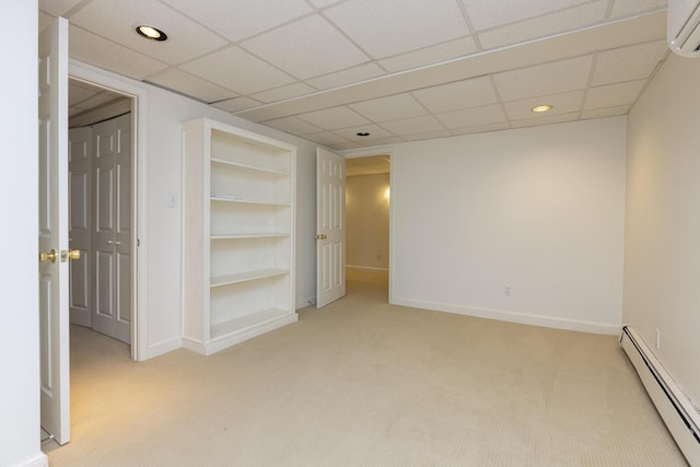 3 Cape Woods Dr Unit 3, Cape Elizabeth, ME 04107 - carpeted empty room with a baseboard radiator, a wall unit AC, recessed lighting, and built in shelves
