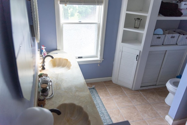 4 E St, Sanford, ME 04073 - bathroom featuring plenty of natural light, tile patterned floors, and vanity