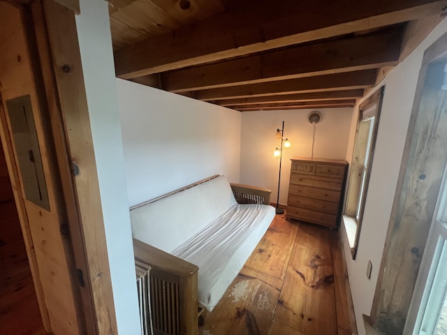 87 Perch Pt, Shapleigh, ME 04076 - unfurnished bedroom with beamed ceiling, electric panel, and hardwood / wood-style floors