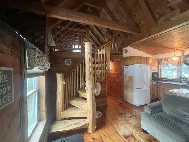 87 Perch Pt, Shapleigh, ME 04076 - kitchen with freestanding refrigerator, vaulted ceiling, light wood-style floors, wooden ceiling, and brown cabinets