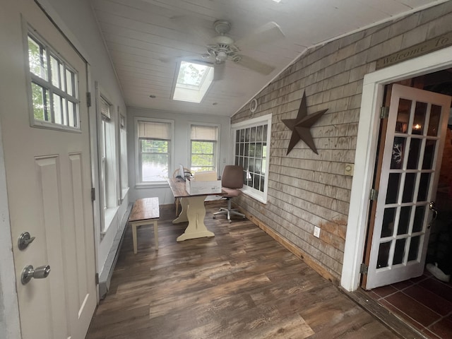87 Perch Pt, Shapleigh, ME 04076 - sunroom featuring a skylight, lofted ceiling, wood finished floors, and brick wall