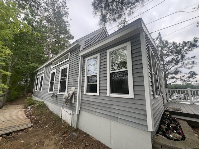 87 Perch Pt, Shapleigh, ME 04076 - view of side of home with a deck