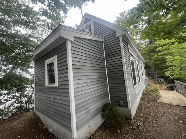87 Perch Pt, Shapleigh, ME 04076 - view of side of home featuring a wooden deck