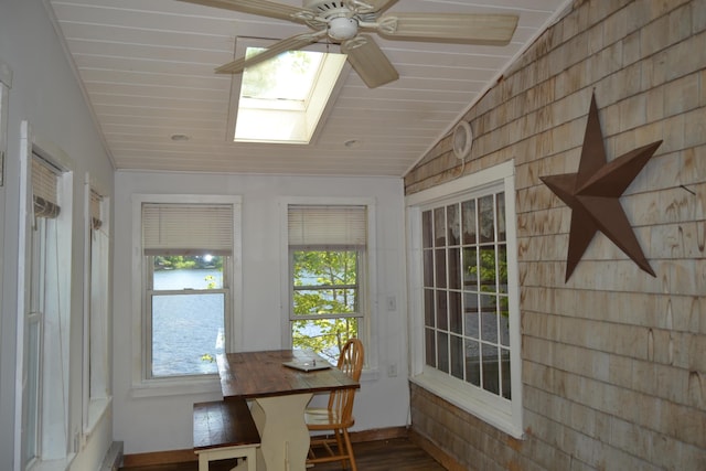 87 Perch Pt, Shapleigh, ME 04076 - unfurnished sunroom featuring lofted ceiling, a skylight, plenty of natural light, and wood finished floors