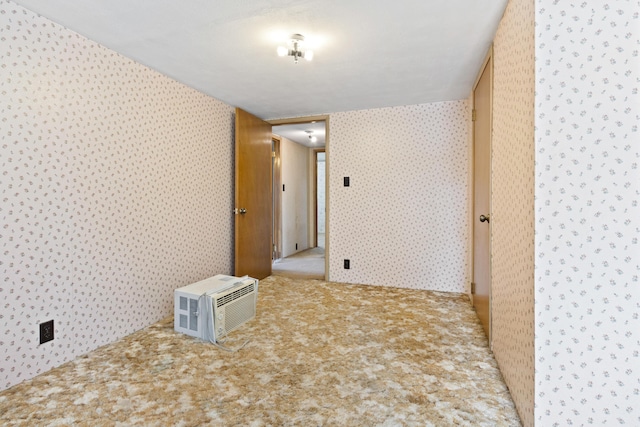 257 N Ave, Skowhegan, ME 04976 - empty room with wallpapered walls and carpet flooring