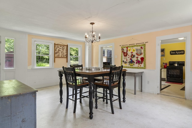 1548 Main St, Readfield, ME 04355 - dining room with a chandelier, ornamental molding, and light floors