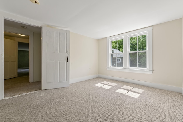 1548 Main St, Readfield, ME 04355 - empty room featuring carpet floors and baseboards