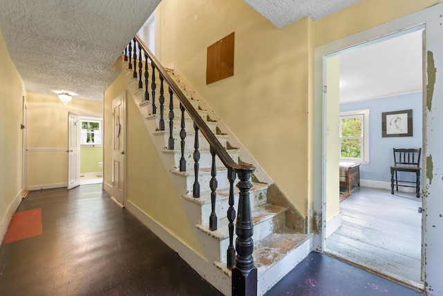 1548 Main St, Readfield, ME 04355 - stairs featuring a textured ceiling