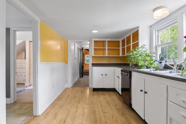 1548 Main St, Readfield, ME 04355 - kitchen featuring dishwasher, dark countertops, open shelves, white cabinets, and a wainscoted wall