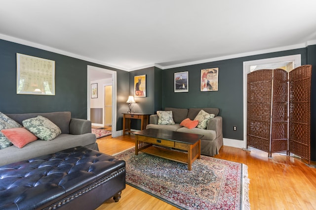 1548 Main St, Readfield, ME 04355 - living room featuring wood finished floors and crown molding