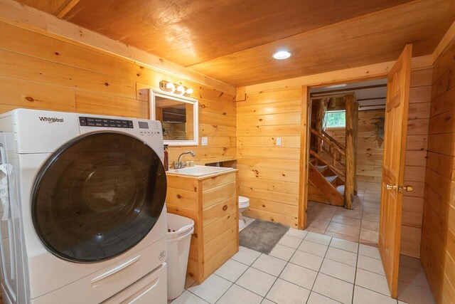 44 Donigan Rd, Moscow, ME 04920 - laundry room with washer / clothes dryer, wood ceiling, wooden walls, light tile patterned flooring, and recessed lighting