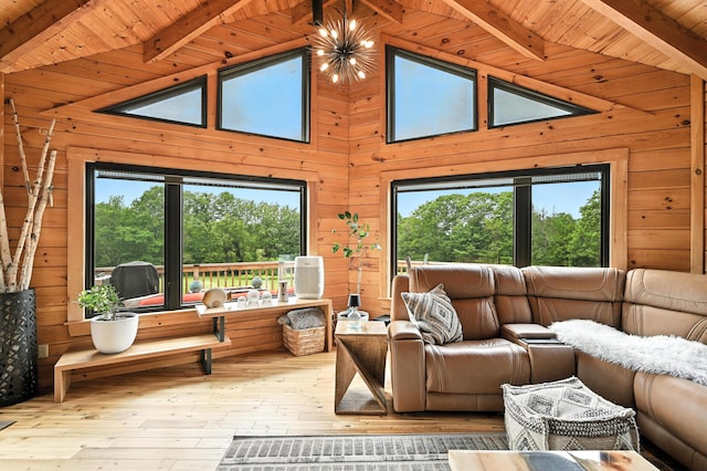 1277 Naples Rd, Harrison, ME 04040 - living room with wooden ceiling, wood walls, and hardwood / wood-style flooring