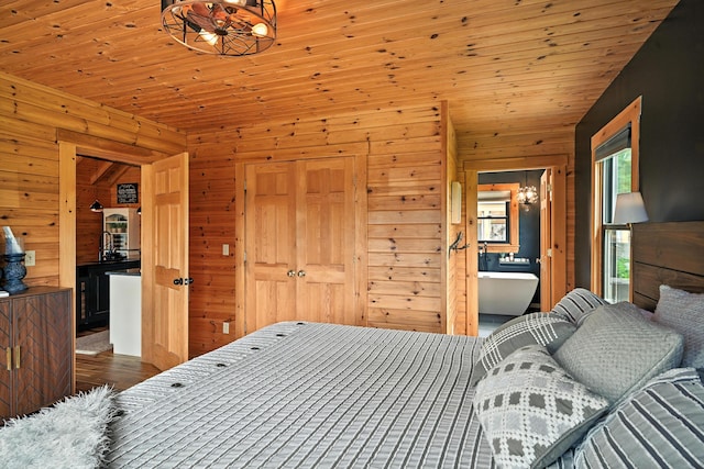 1277 Naples Rd, Harrison, ME 04040 - bedroom with wooden walls, wooden ceiling, and dark wood-style flooring