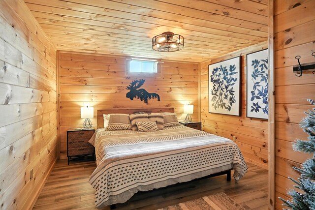 1277 Naples Rd, Harrison, ME 04040 - bedroom featuring wood finished floors, wooden ceiling, and wooden walls