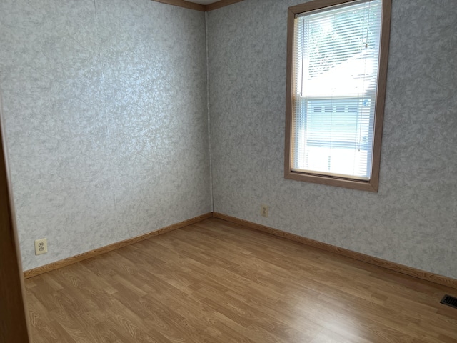 406 Cushman Rd, Winslow, ME 04901 - spare room with wood finished floors and baseboards
