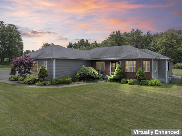 96 Frost Hill Ave, Lisbon, ME 04252 - ranch-style home with a front lawn, a chimney, and brick siding