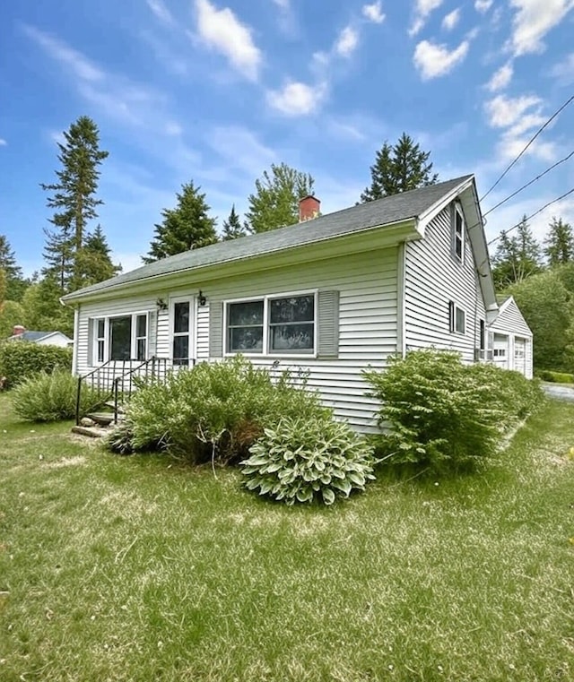1190 Indian River Rd, Addison, ME 04606 - view of side of property with a yard and a chimney
