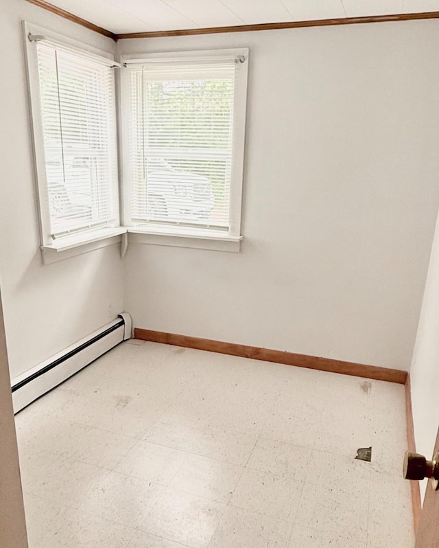 1190 Indian River Rd, Addison, ME 04606 - empty room with a baseboard radiator, tile patterned floors, and crown molding